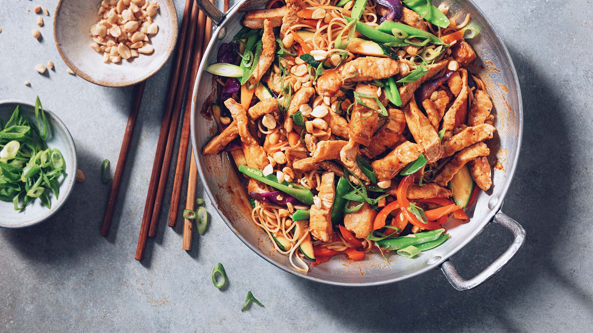 ENGLISH, AFRIKAANS BELOW STIR-FRIED PORK WITH CHILLI AND PEANUTS