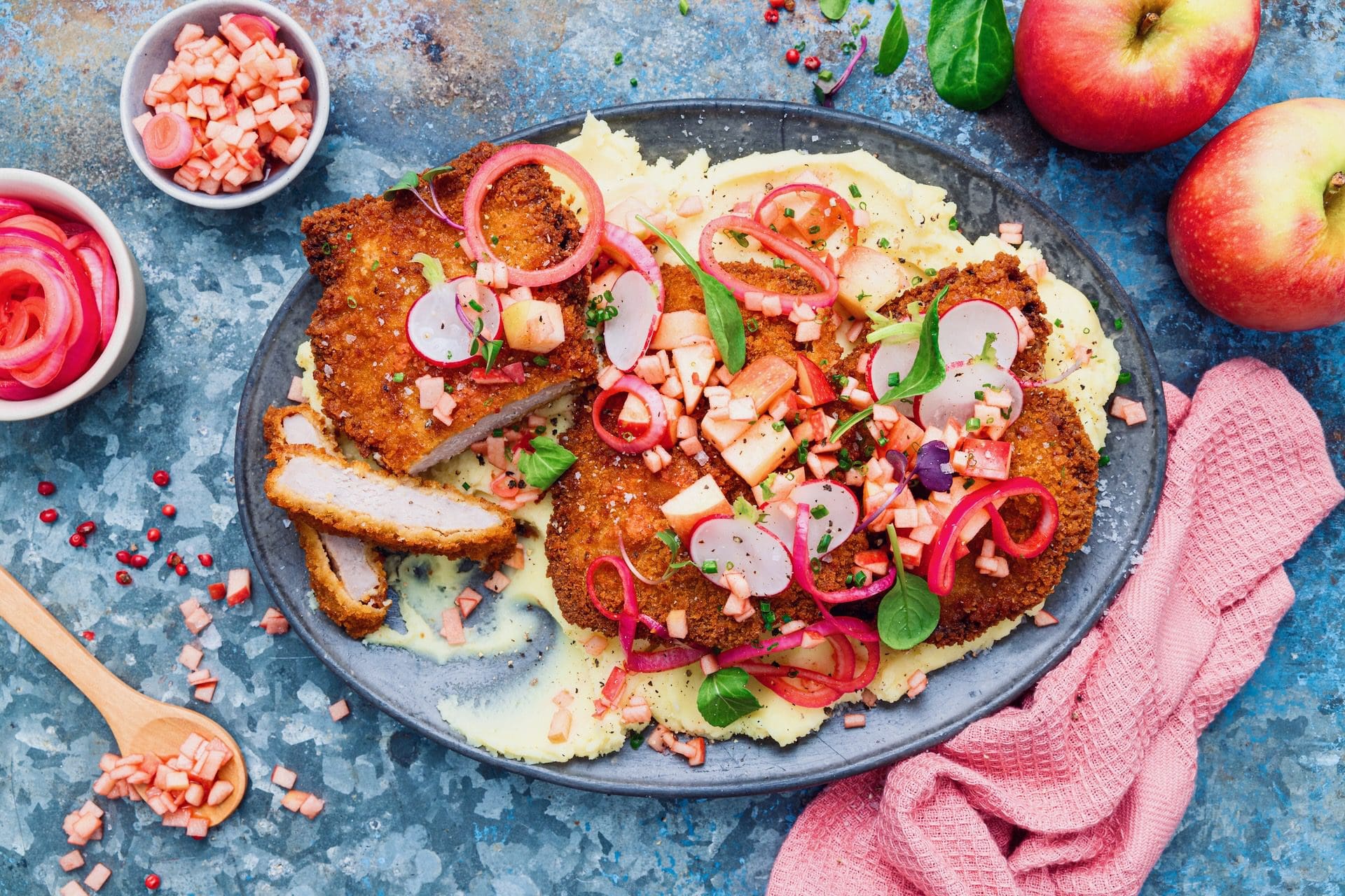 Crumbed Pork Schnitzels with Pink Lady Apple & Onion Pickle